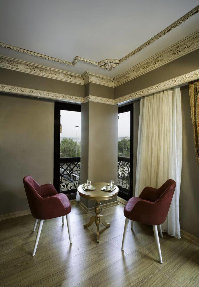 Hotel Phosphorion à Istambul Extérieur photo A room at the hotel