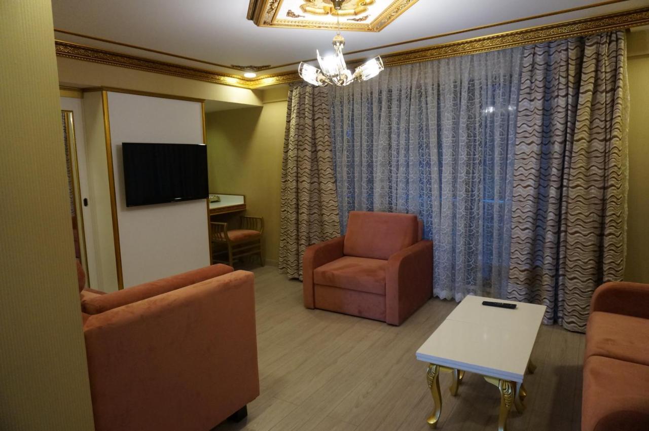 Hotel Phosphorion à Istambul Extérieur photo A living room in a hotel