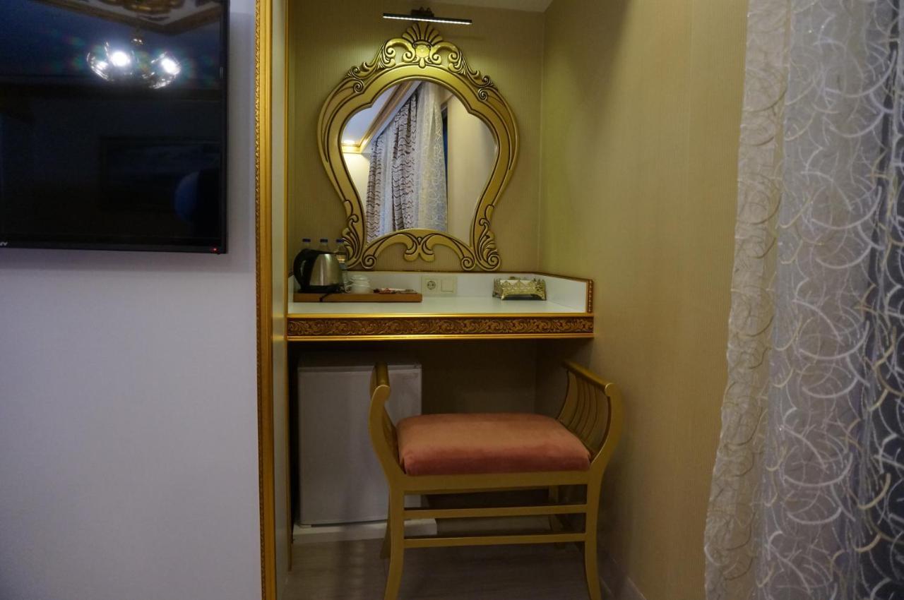 Hotel Phosphorion à Istambul Extérieur photo A dressing table in a hotel room